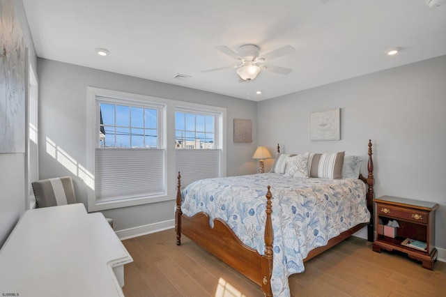 bedroom featuring ceiling fan and light wood-type flooring