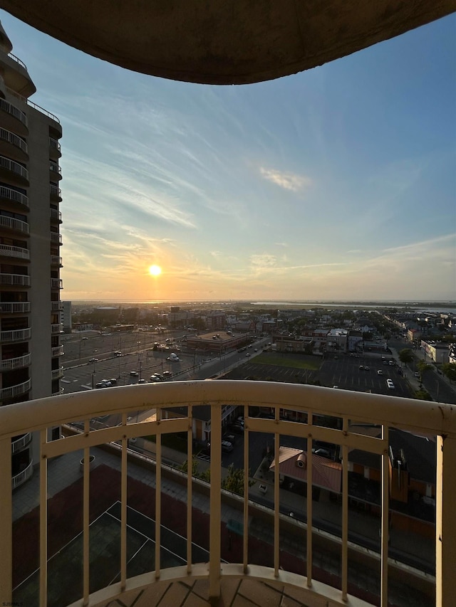 view of balcony at dusk