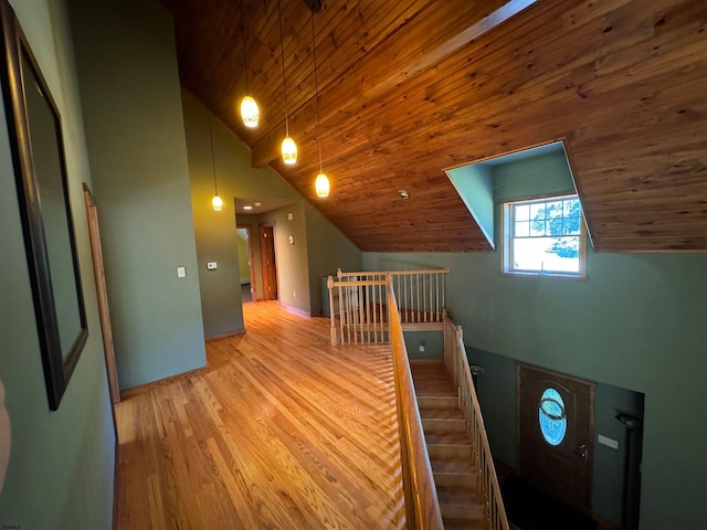 bonus room with wooden ceiling, wood finished floors, baseboards, and lofted ceiling