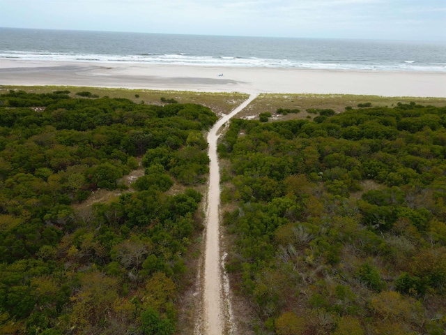 aerial view featuring a view of the beach and a water view