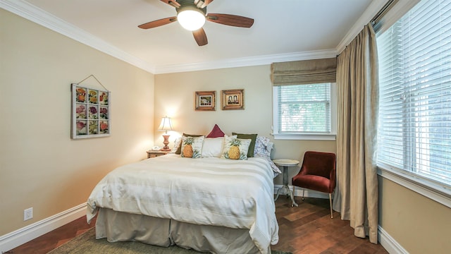 bedroom featuring ceiling fan, dark wood-type flooring, and ornamental molding