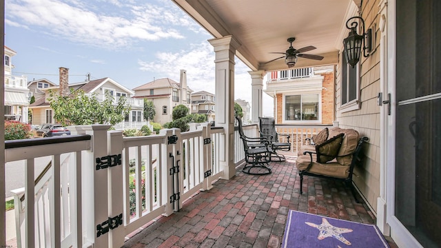 balcony featuring ceiling fan