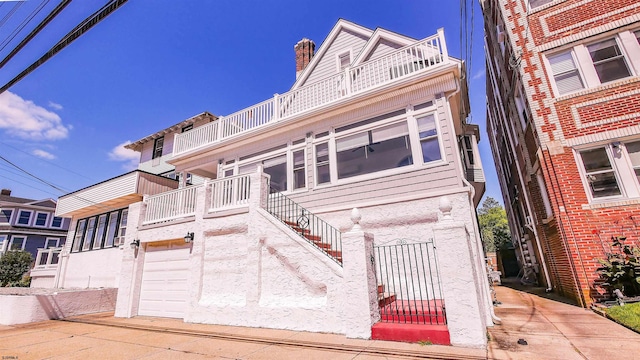 view of front of home with stairs