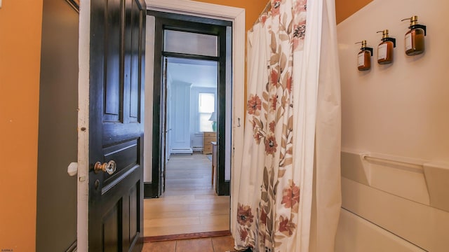 corridor featuring tile patterned flooring