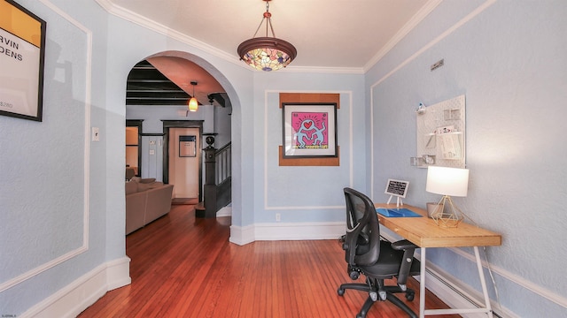 office space featuring arched walkways, ornamental molding, baseboards, and wood finished floors