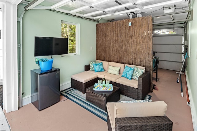 interior space with a garage and concrete floors