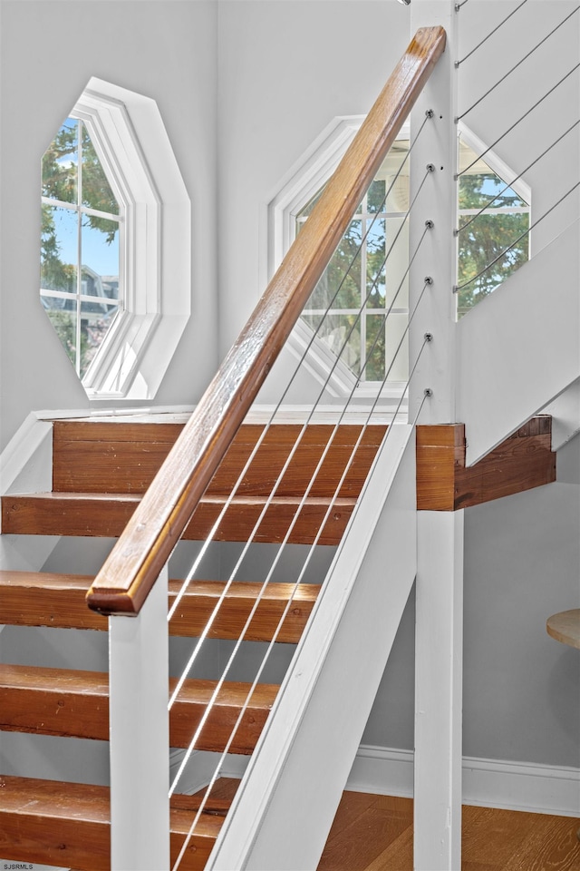 staircase with baseboards