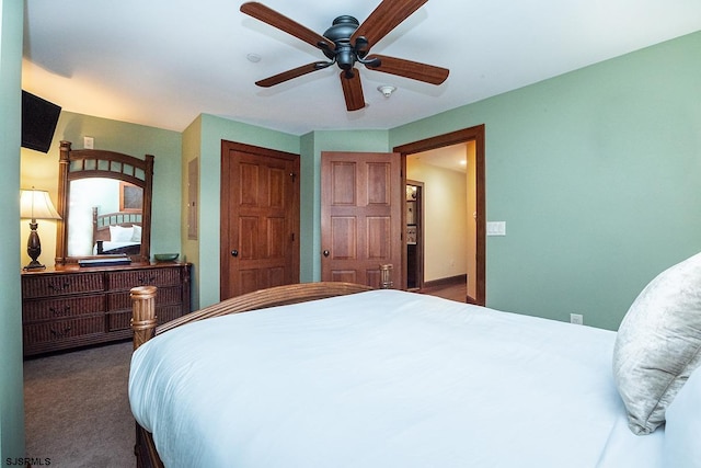 bedroom featuring a closet, a ceiling fan, and carpet flooring