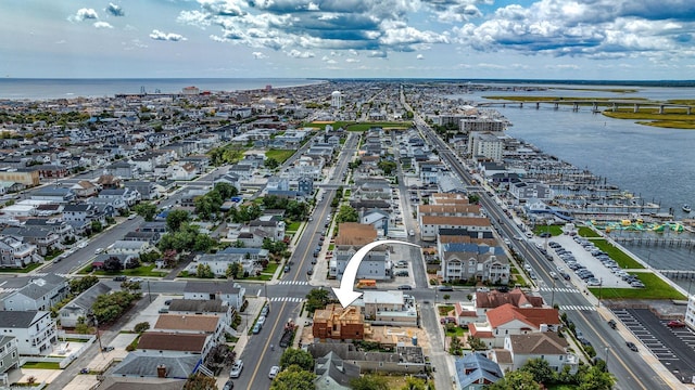 drone / aerial view with a water view and a view of city