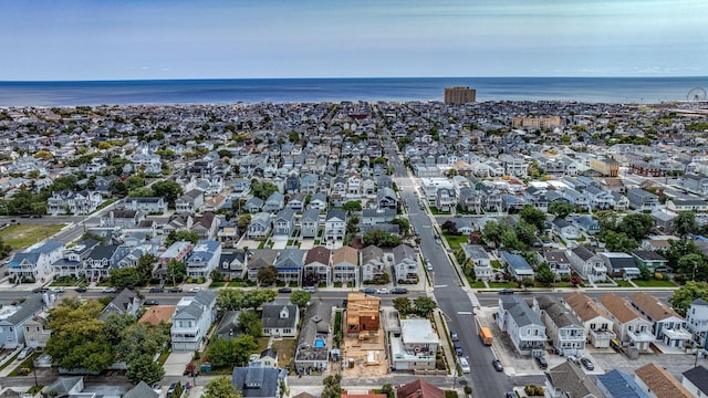 aerial view with a water view and a residential view