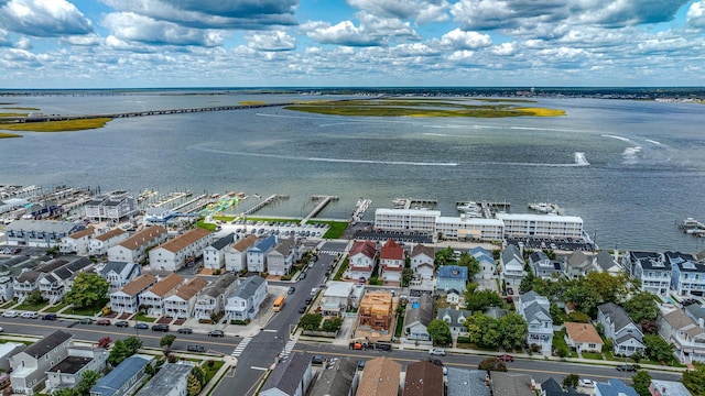 aerial view with a residential view and a water view