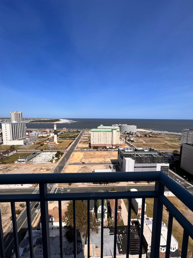 balcony featuring a water view