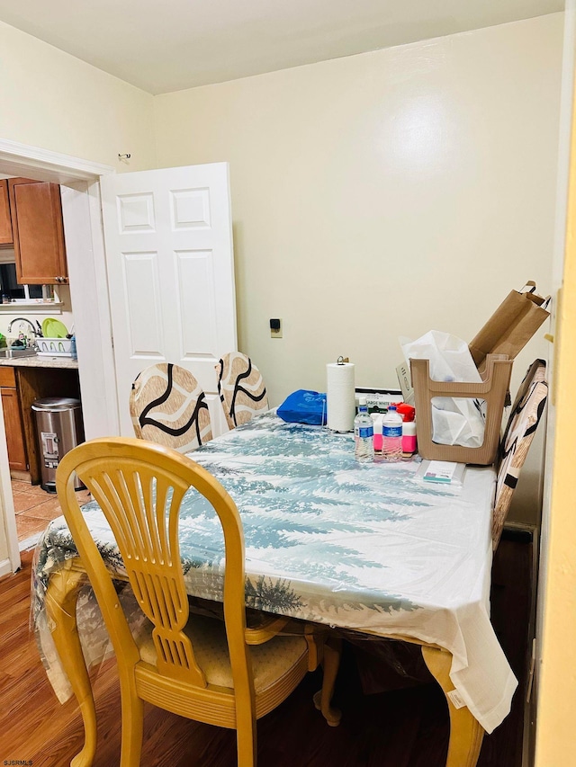 dining area with light hardwood / wood-style floors