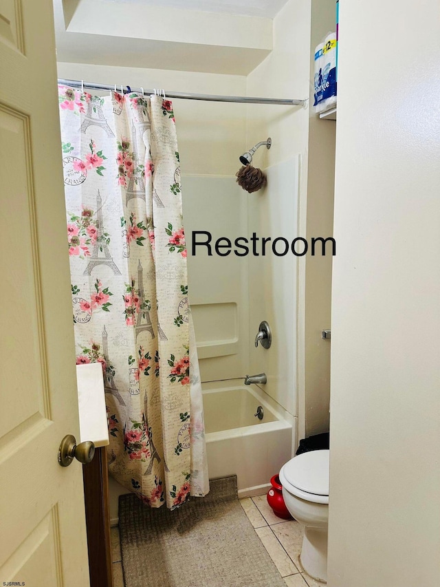 full bathroom featuring vanity, toilet, shower / bath combination with curtain, and tile patterned floors