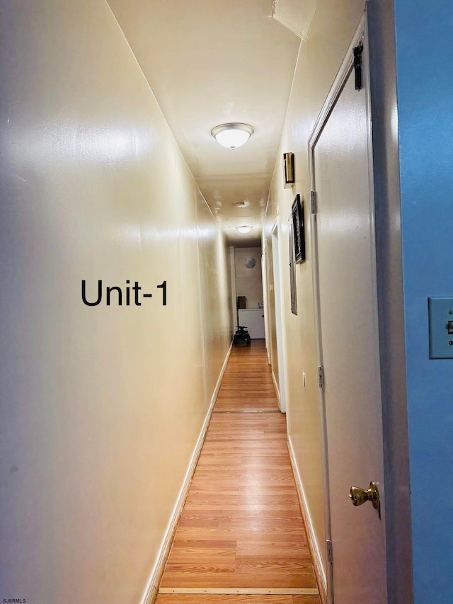 corridor featuring light hardwood / wood-style flooring