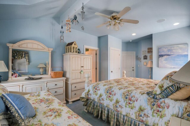 carpeted bedroom featuring a closet and ceiling fan