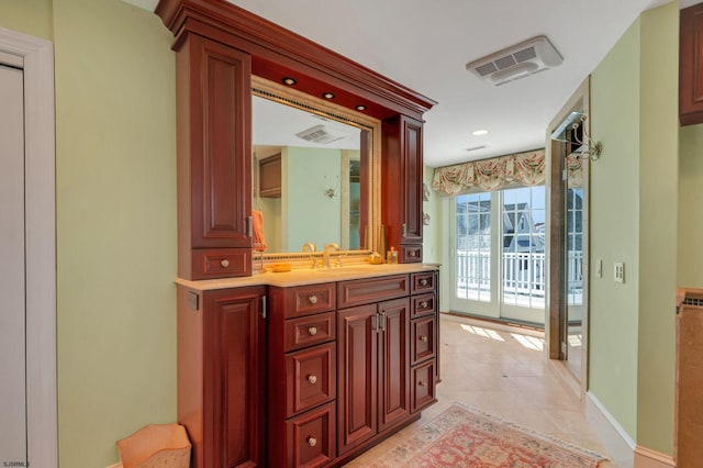 bathroom featuring vanity and tile patterned floors