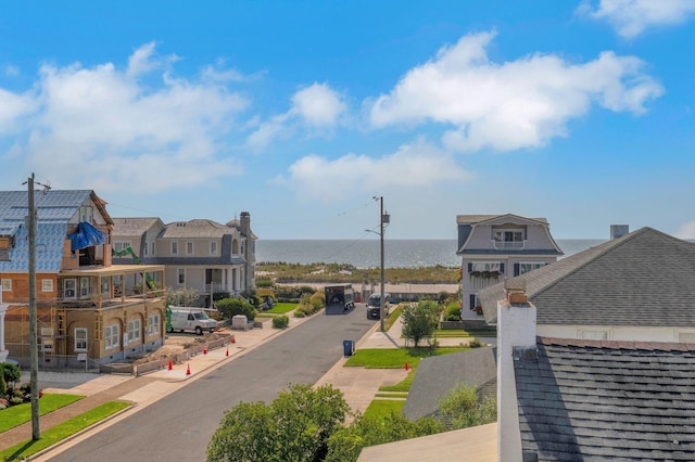 exterior space with a water view