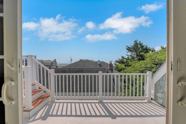 view of patio featuring a balcony