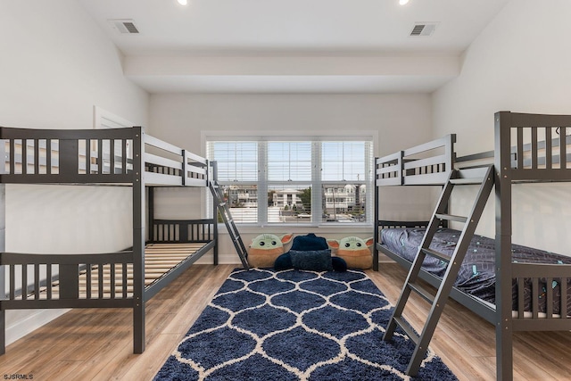 bedroom with wood-type flooring