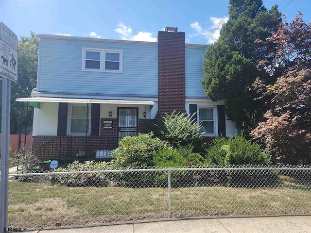 view of front of property with a front yard