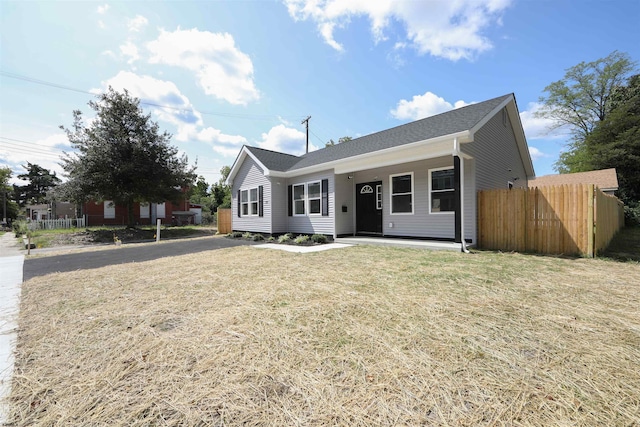 ranch-style house with a front yard