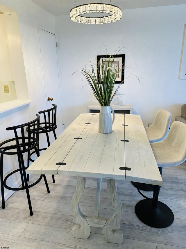 dining space featuring light hardwood / wood-style floors