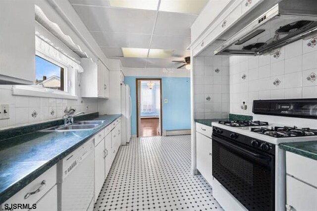 additional living space featuring lofted ceiling and baseboard heating