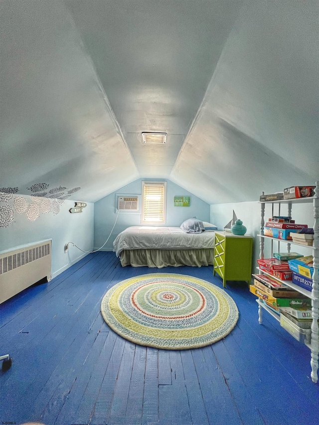 bedroom featuring lofted ceiling, hardwood / wood-style flooring, radiator, and a wall mounted air conditioner