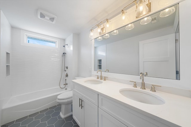 full bathroom with vanity, toilet, bathtub / shower combination, and tile patterned floors