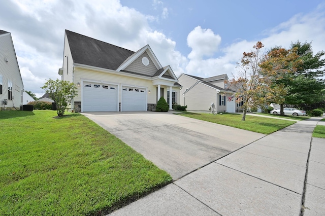 view of front of property with a garage and a front yard