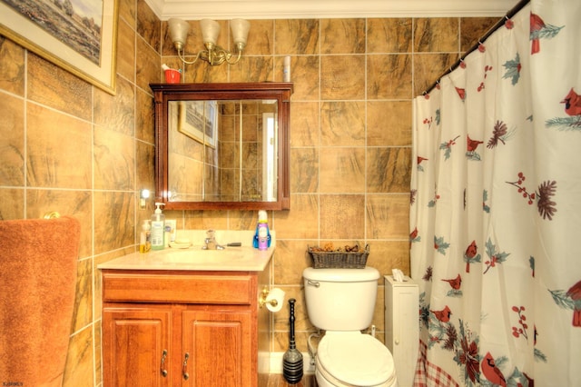 bathroom with curtained shower, crown molding, toilet, tile walls, and vanity