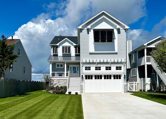 view of front facade featuring a front yard and a garage