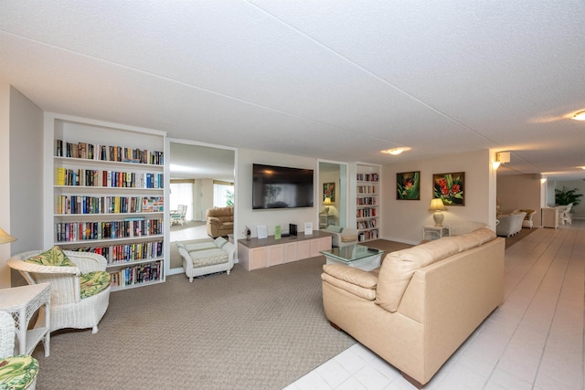 living room with a textured ceiling