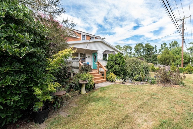 view of front of house with a front yard