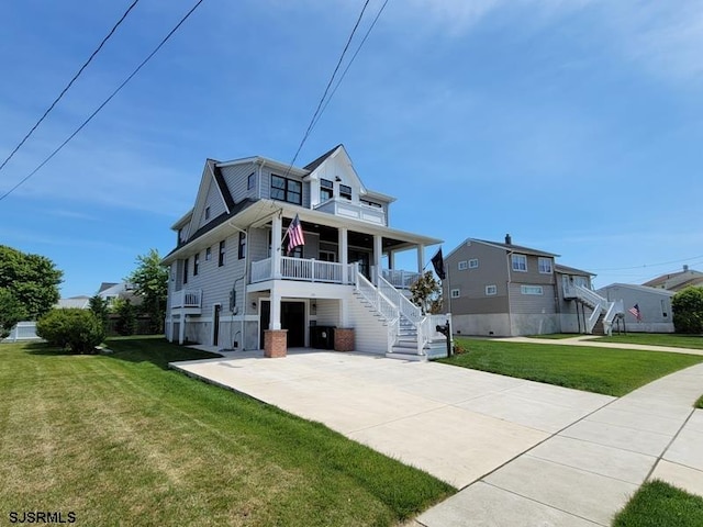 view of front of home with a front lawn and covered porch