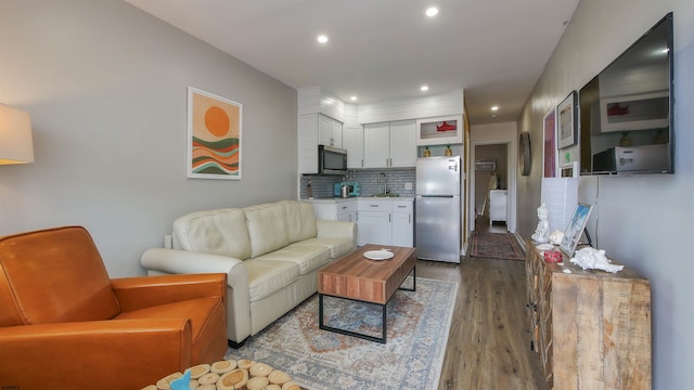 living room with hardwood / wood-style flooring