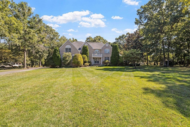 view of front of house with a front lawn