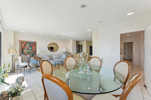 dining area with light tile patterned flooring