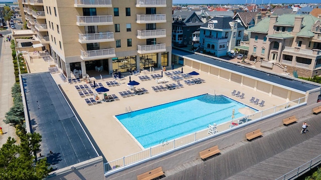 view of swimming pool featuring a patio