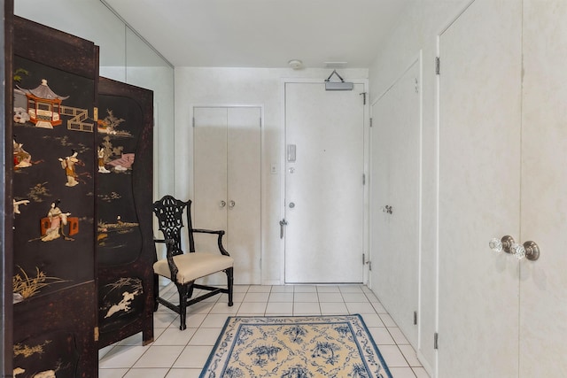 interior space featuring light tile patterned floors