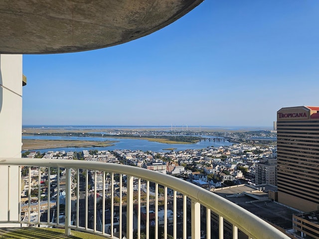 balcony featuring a water view