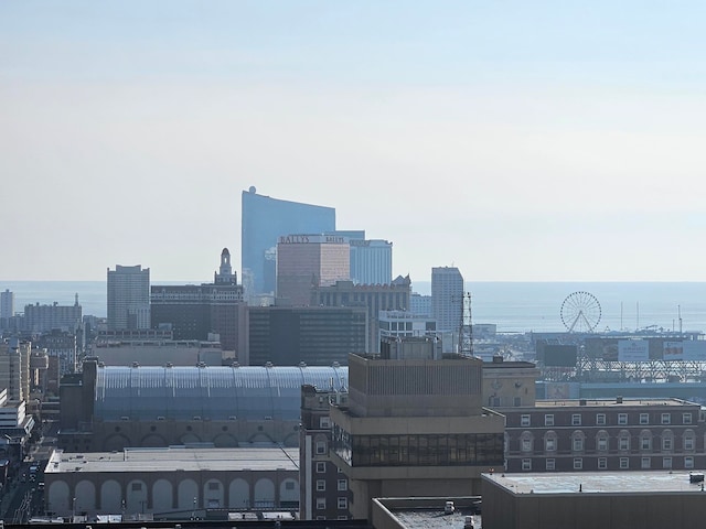 property's view of city featuring a water view