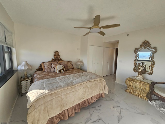 bedroom featuring a closet and ceiling fan