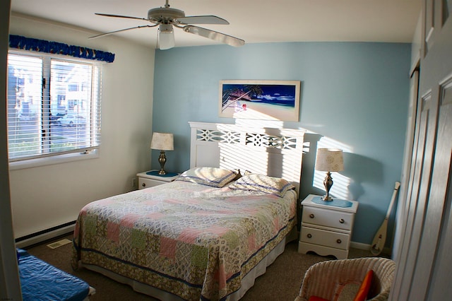 bedroom featuring a baseboard radiator, ceiling fan, and carpet