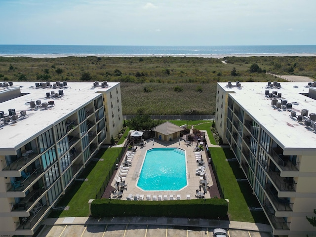 exterior space featuring a patio and a water view