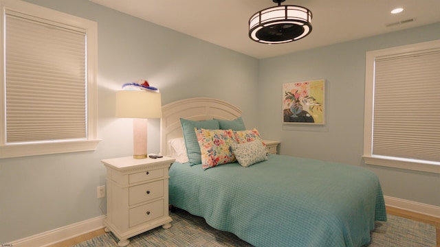 bedroom featuring hardwood / wood-style floors