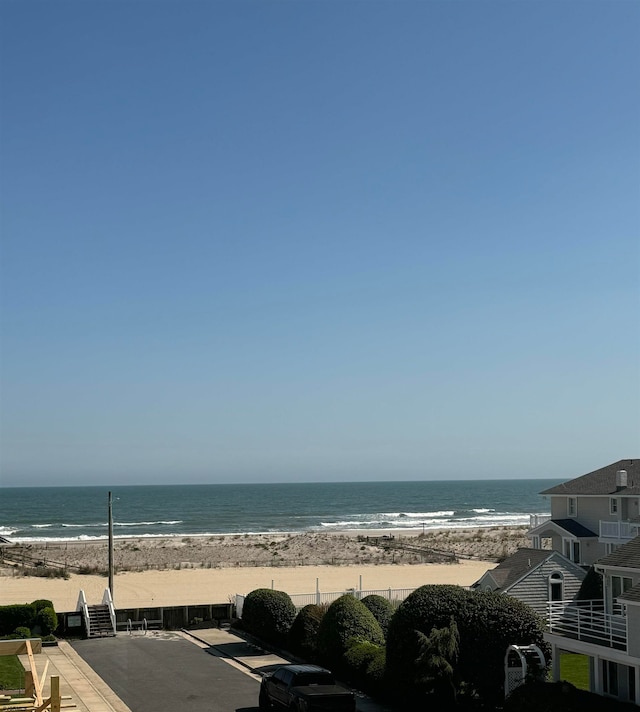 property view of water featuring a view of the beach