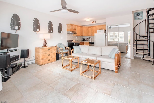 living room featuring ceiling fan