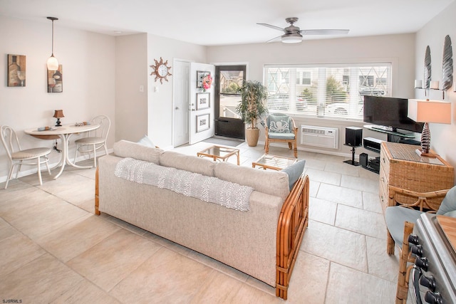 living room featuring ceiling fan and a wall unit AC